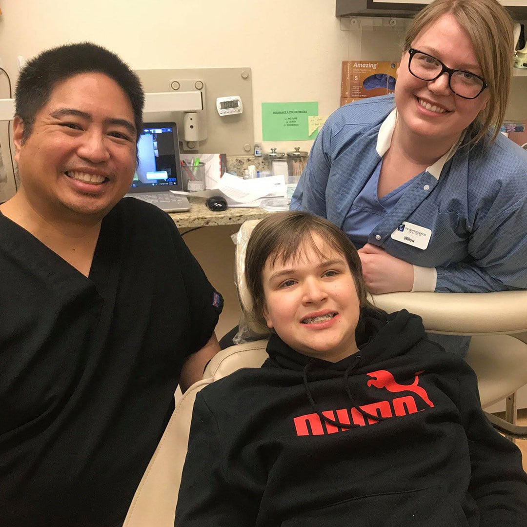 Dr. Llanes with a pediatric patient in Roselle, IL. Patient Gallery